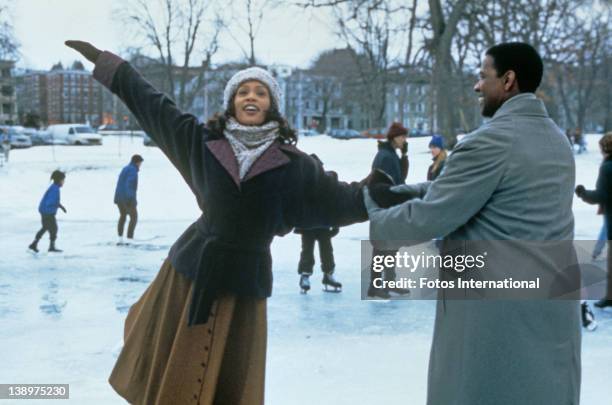 American singer and actress Whitney Houston stars with Denzel Washington in the film 'The Preacher's Wife', 1996.