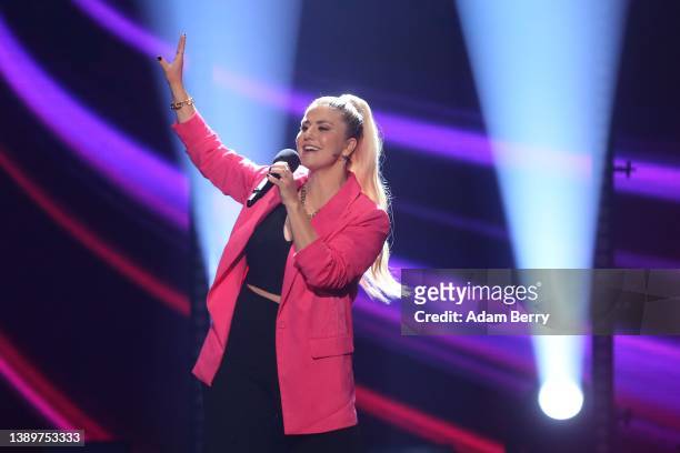 Beatrice Egli performs on stage during the tv show "Die Beatrice Egli-Show" at Studio Berlin Adlershof on April 05, 2022 in Berlin, Germany.