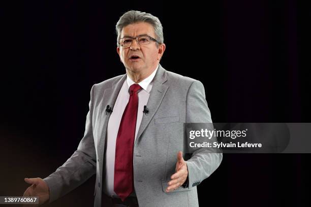 The candidate of the French left in the presidential election, Jean-Luc Mélenchon gestures as he delivers a speech during the last meeting of his...