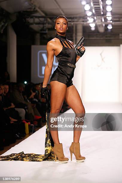Fashion model Eva Marcille walks the runway at the Sachika fall 2012 fashion show during Style360 at Metropolitan Pavilion on February 14, 2012 in...
