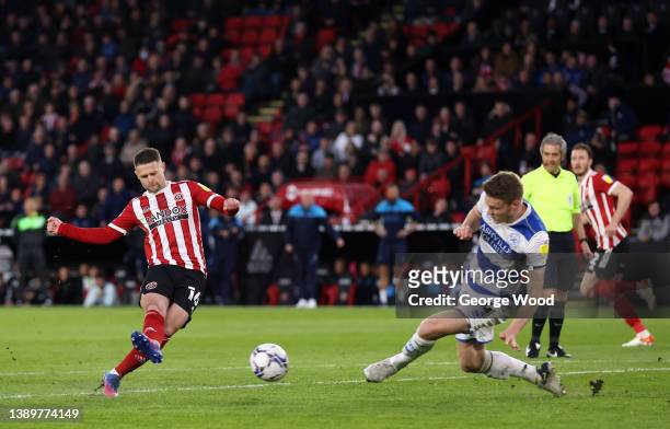 Oliver Norwood of Sheffield United scores their side's first goal during the Sky Bet Championship match between Sheffield United and Queens Park...