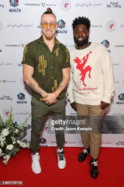 George Kittle and Delanie Walker attend the Hall of Fame Health and Fund Recovery Inaugural Charity Concert & Dinner at The Twelve Thirty Club on...