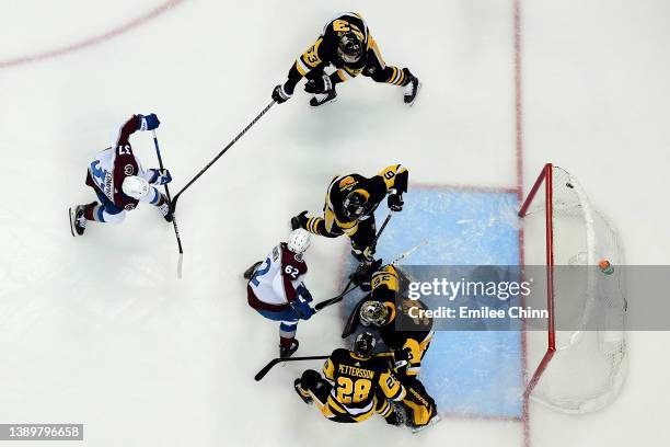 Compher of the Colorado Avalanche scores a goal during the second period against the Pittsburgh Penguins at PPG PAINTS Arena on April 05, 2022 in...