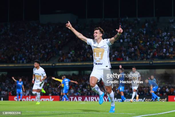 Juan Dinenno of Pumas UNAM celebrates after scoring his team’s first goal during the semifinal first leg match between Pumas UNAM and Cruz Azul as...