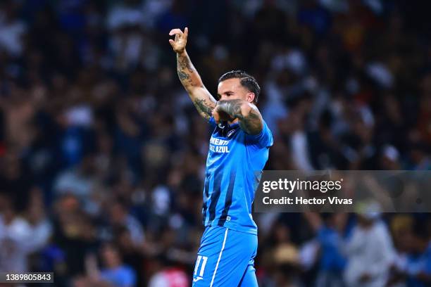 Christian Tabo of Cruz Azul celebrates after scoring his team’s first goal during the semifinal first leg match between Pumas UNAM and Cruz Azul as...