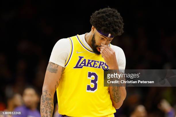 Anthony Davis of the Los Angeles Lakers walks to the bench during the second half of the NBA game against the Phoenix Suns at Footprint Center on...