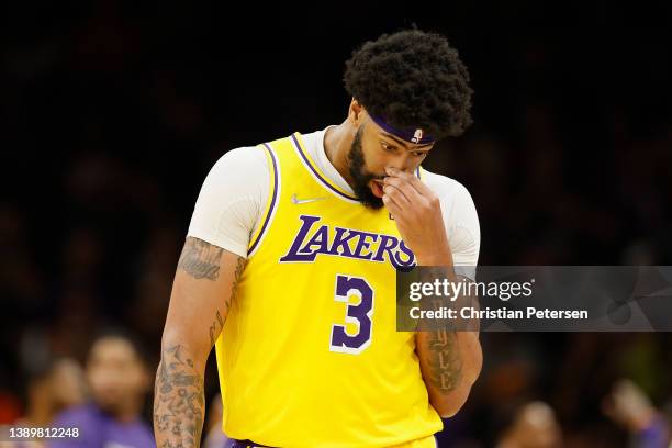 Anthony Davis of the Los Angeles Lakers walks to the bench during the second half of the NBA game against the Phoenix Suns at Footprint Center on...