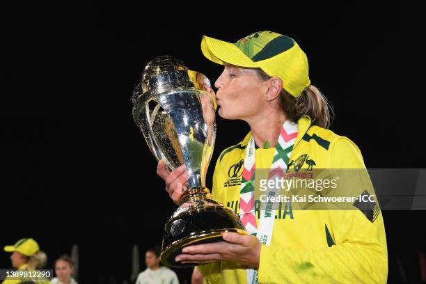 Captain Meg Lanning of Australia kisses the trophy after winning the 2022 ICC Women's Cricket World Cup Final match between Australia and England at...