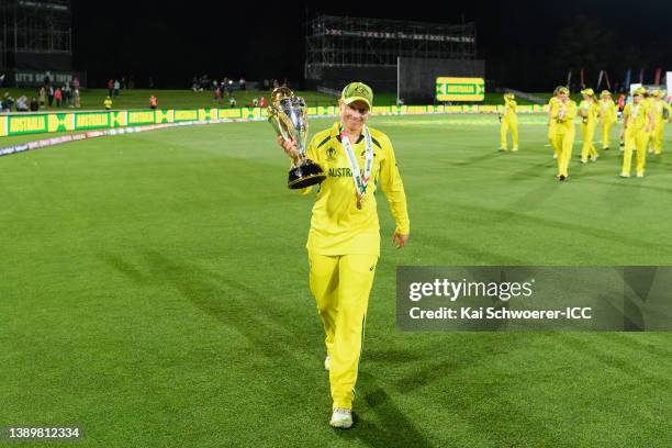 Alyssa Healy of Australia celebrates with the trophy after winning the 2022 ICC Women's Cricket World Cup Final match between Australia and England...