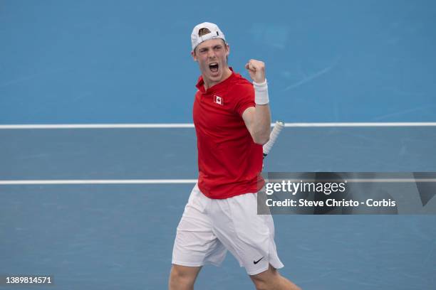 Denis Shapovalov of Canada reacts to winning his match against Russia's Roman Safiullin during their 2022 ATP Cup tie on day eight between Canada and...