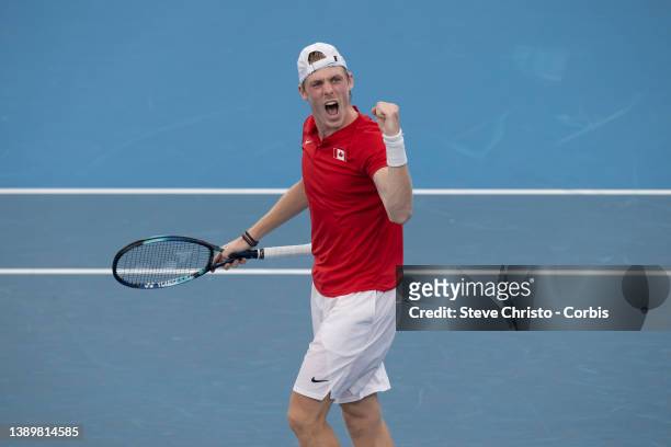 Denis Shapovalov of Canada reacts to winning his match against Russia's Roman Safiullin during their 2022 ATP Cup tie on day eight between Canada and...