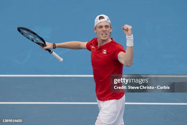 Denis Shapovalov of Canada reacts to winning his match against Russia's Roman Safiullin during their 2022 ATP Cup tie on day eight between Canada and...