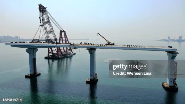 sectional construction of offshore bridge - building foundations stock pictures, royalty-free photos & images