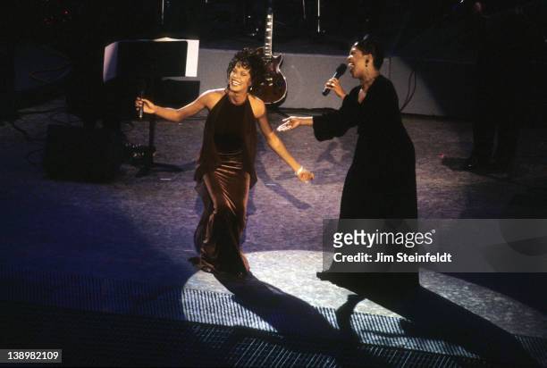 Whitney Houston and CeCe Winans perform at the Grammy Awards in Los Angeles, California on February 28, 1996.
