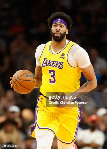 Anthony Davis of the Los Angeles Lakers handles the ball during the first half of the NBA game against the Phoenix Suns at Footprint Center on April...