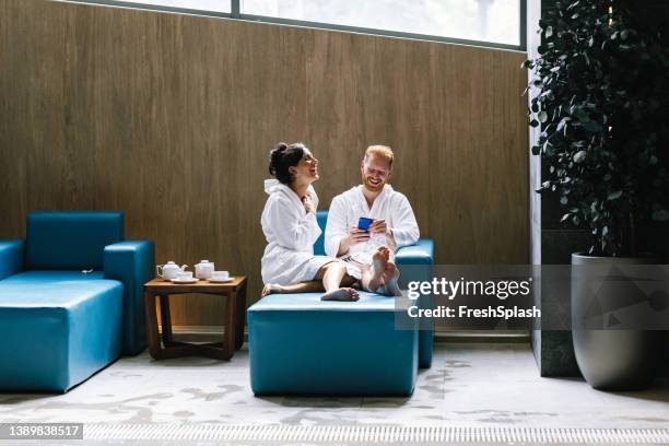 couplecouple enjoying their time in the spa centre - spa stock pictures, royalty-free photos & images