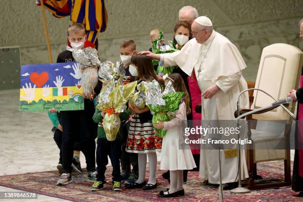 Pope Francis meets Ukrainian refugees during his weekly general audience at Paul VI Hall on April 06, 2022 in Vatican City, Vatican. As the extent of...