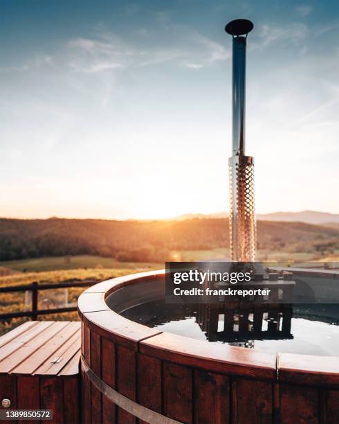 relax in the hot tub at dusk - whirlpool bildbanksfoton och bilder