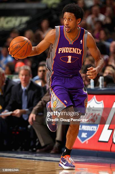 Josh Childress of the Phoenix Suns dribbles the ball against the Denver Nuggets at the Pepsi Center on February 14, 2012 in Denver, Colorado. The...