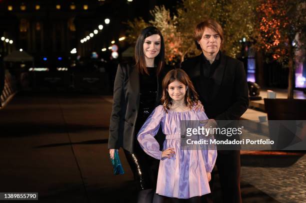 Italian singer Laura Pausini, Italian musician Paolo Carta and daughter Paola on the red carpet at the premiere Pleased to meet you at the...