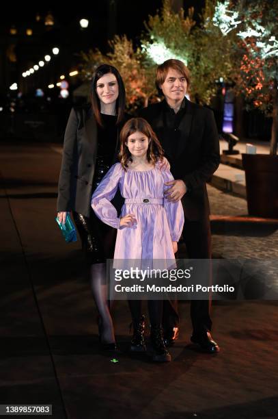 Italian singer Laura Pausini, Italian musician Paolo Carta and daughter Paola on the red carpet at the premiere Pleased to meet you at the...