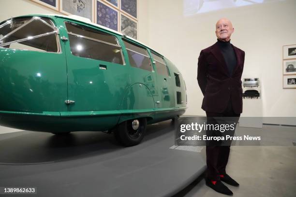 The curator of the exhibition, Lord Norman Foster, poses with a car at the presentation of 'Motion', at the Guggenheim Museum Bilbao, April 6 in...