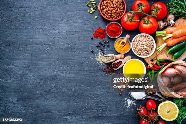 cooking and seasoning frame on dark background. copy space - food table edge stock pictures, royalty-free photos & images