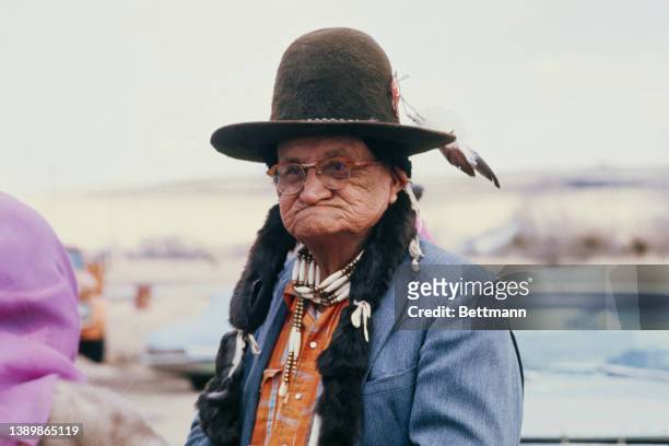 Native American ceremonial chief and spiritual leader of the Oglalla Sioux Frank Fools Crow , wearing a Native American bone choker, arrives to...