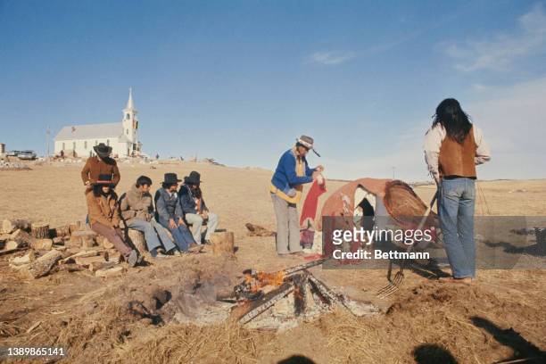 American Indian Movement activists ready themselves for a purification ceremony at the site of the 1890 Wounded Knee Massacre, the Sacred Heart...