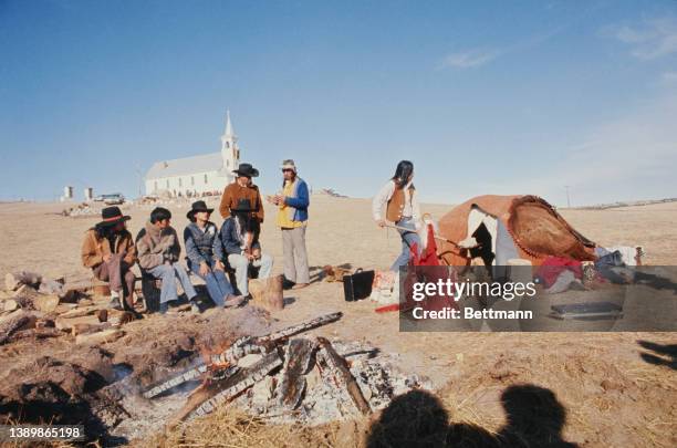 American Indian Movement activists ready themselves for a purification ceremony at the site of the 1890 Wounded Knee Massacre, the Sacred Heart...