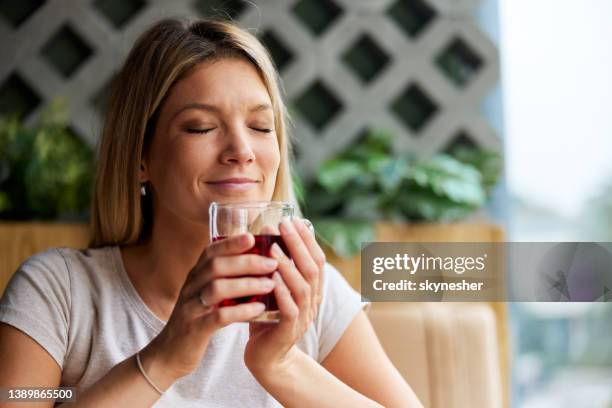 how i love the smell of fresh tea! - drinking tea in a cup stock pictures, royalty-free photos & images