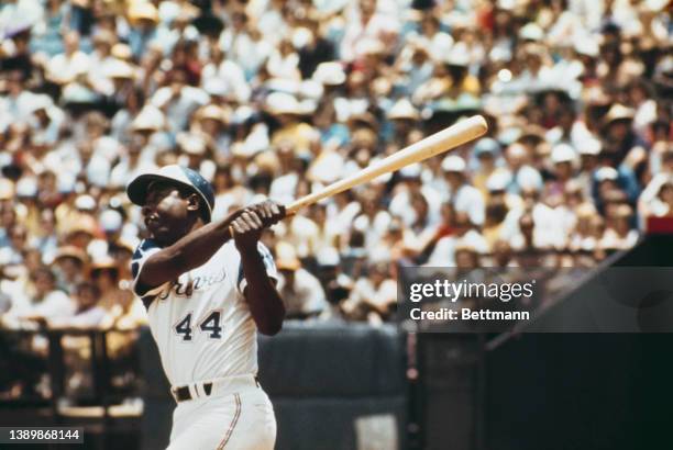 American baseball player Hank Aaron batting for the Atlanta Braves during their Major League Baseball match against the Philadelphia Phillies, at the...