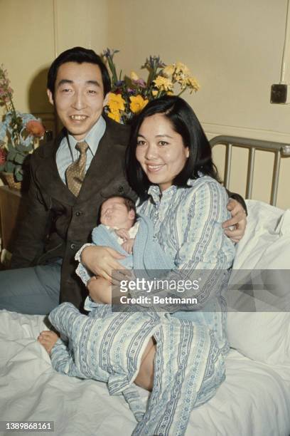 Japanese Royal Nobuhiko Higashikuni and his wife, Yoshiko Higashikuni, with their newborn son, Yukihiko Higashikuni, in the hospital where Yukihiko...