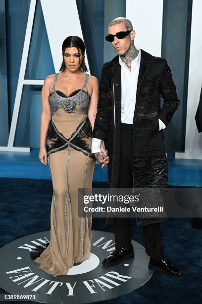 Kourtney Kardashian and Travis Barker attend 2022 Vanity Fair Oscar Party Hosted By Radhika Jones at Wallis Annenberg Center for the Performing Arts...