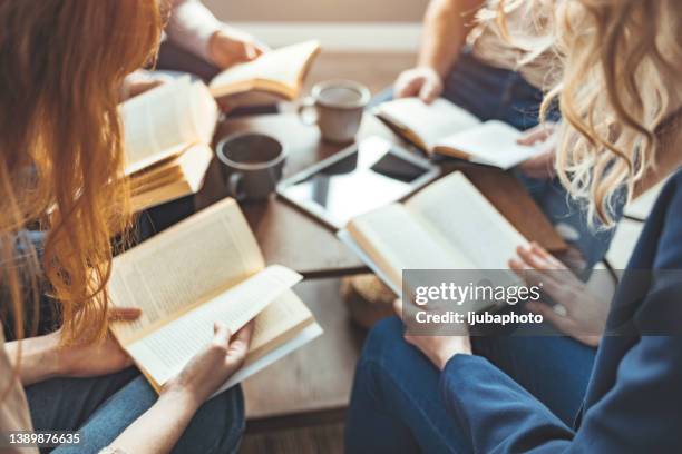 friends at a book club - literature review stock pictures, royalty-free photos & images