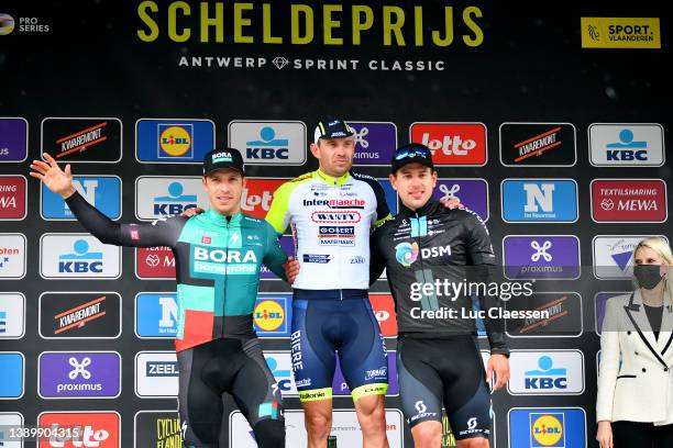 Danny Van Poppel of Netherlands and Team Bora - Hansgrohe on second place, stage winner Alexander Kristoff of Norway and Team Intermarché - Wanty -...