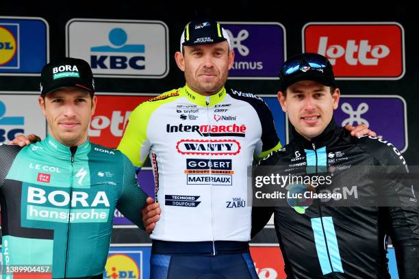 Danny Van Poppel of Netherlands and Team Bora - Hansgrohe on second place, stage winner Alexander Kristoff of Norway and Team Intermarché - Wanty -...