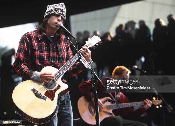 Dave Grohl and Nate Mendel of Foo Fighters perform during Neil Young's 14th Annual Bridge Benefit at Shoreline Amphitheatre on October 29, 2000 in...