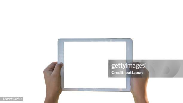 white tablet computer isolated on white background - hands holding ipad stock pictures, royalty-free photos & images