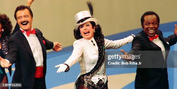 Ann Miller performs with Robert Goulet and Lou Rawls during 'Hollywood 100th Birthday' celebration, April 26, 1987 in Hollywood section of Los...