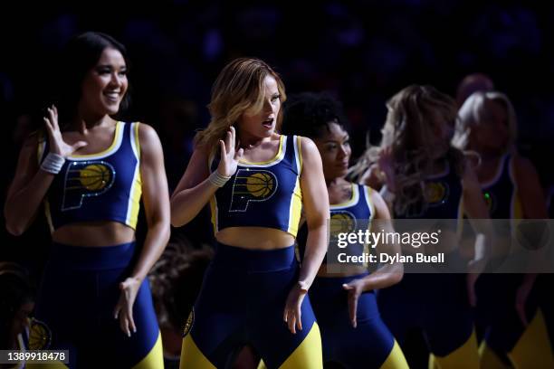 Members of the Indiana Pacers dance team perform during the game between the Philadelphia 76ers and the Indiana Pacers at Gainbridge Fieldhouse on...