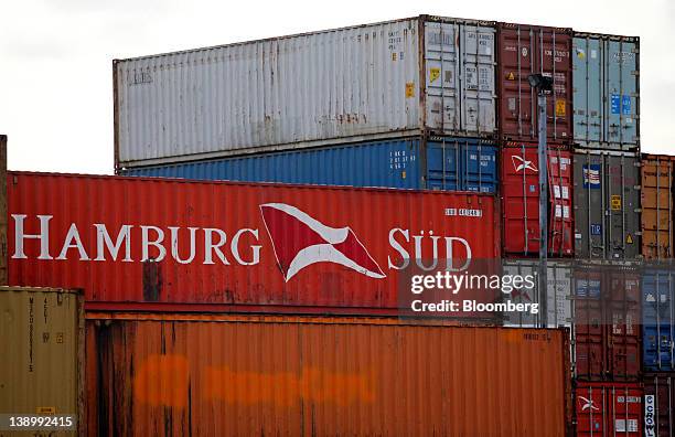 Hamburg Sud logo sits on the side of a shipping container as it sits stacked on the quay side at the Port of Tilbury, operated by Forth Ports Ltd.,...