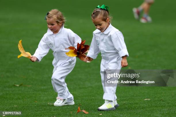 Daughters of Paul Casey of England and Sergio Garcia of Spain, Astaria Casey and Azalea Garcia during the Par Three Contest prior to the Masters at...