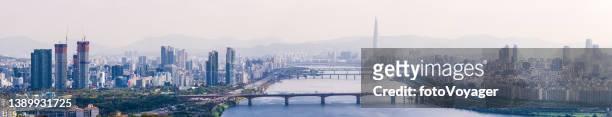 seoul misty morning aerial panorama over han river skyscraper cityscape - lotte world tower stock pictures, royalty-free photos & images