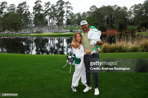 Erik van Rooyen of South Africa, wife Rose van Rooyen and daughter Valarie van Rooyen during the Par Three Contest prior to the Masters at Augusta...
