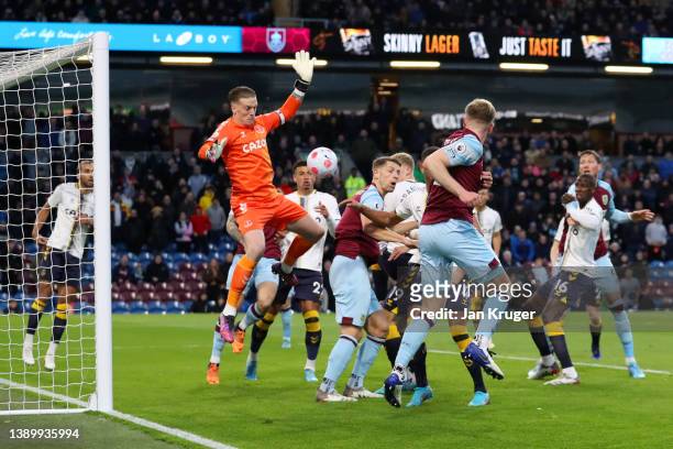 Nathan Collins of Burnley scores their team's first goal past Jordan Pickford of Everton during the Premier League match between Burnley and Everton...