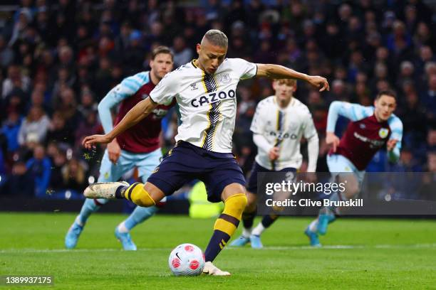 Richarlison of Everton scores their team's first goal from the penalty spot during the Premier League match between Burnley and Everton at Turf Moor...