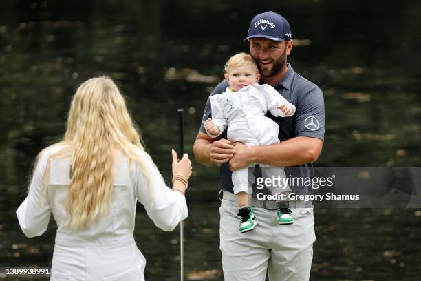 Jon Rahm of Spain, wife Kelley Cahill and son Kepa Rahm during the Par Three Contest prior to the Masters at Augusta National Golf Club on April 06,...
