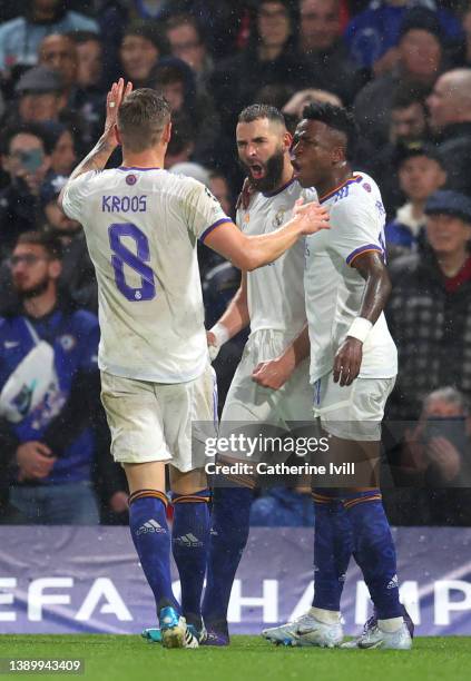 Karim Benzema of Real Madrid celebrates after scoring their team's second goal during the UEFA Champions League Quarter Final Leg One match between...