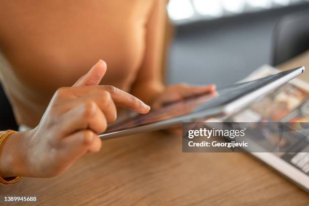 using digital tablet - multimedia stockfoto's en -beelden